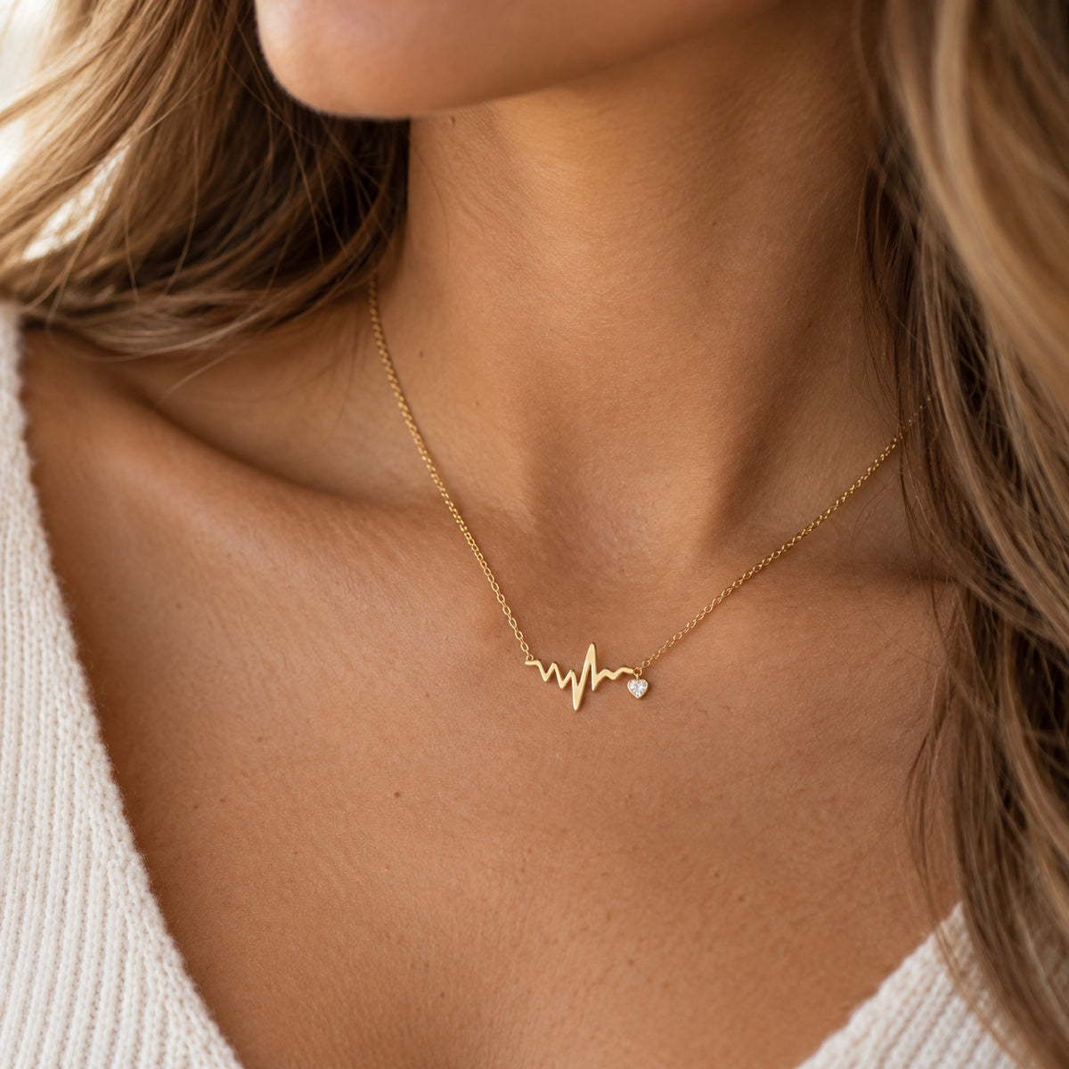 gold heartbeat necklace with heart cz charm