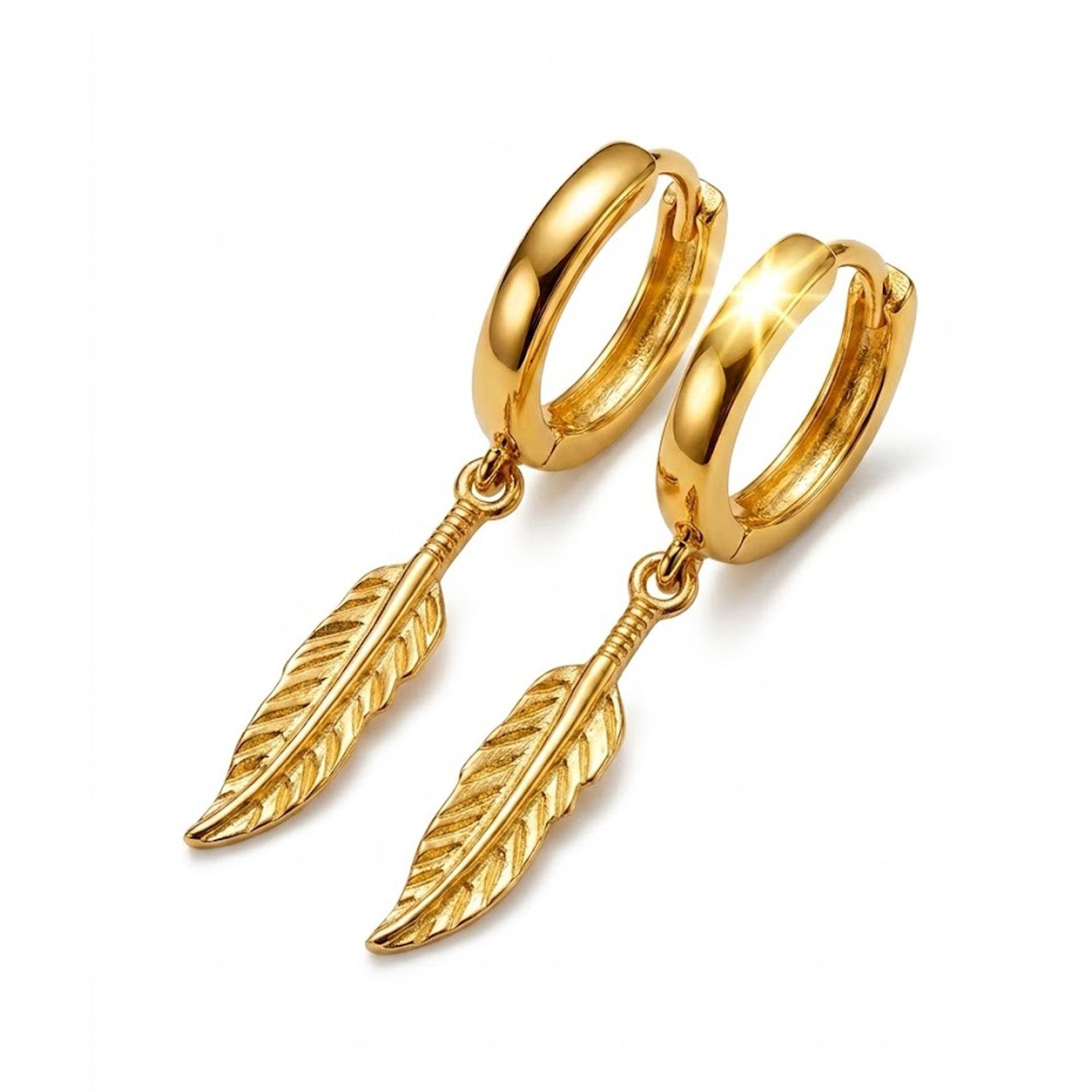 A pair of gold huggie hoop earrings with dangling textured feather charms, shown on a clean white background.