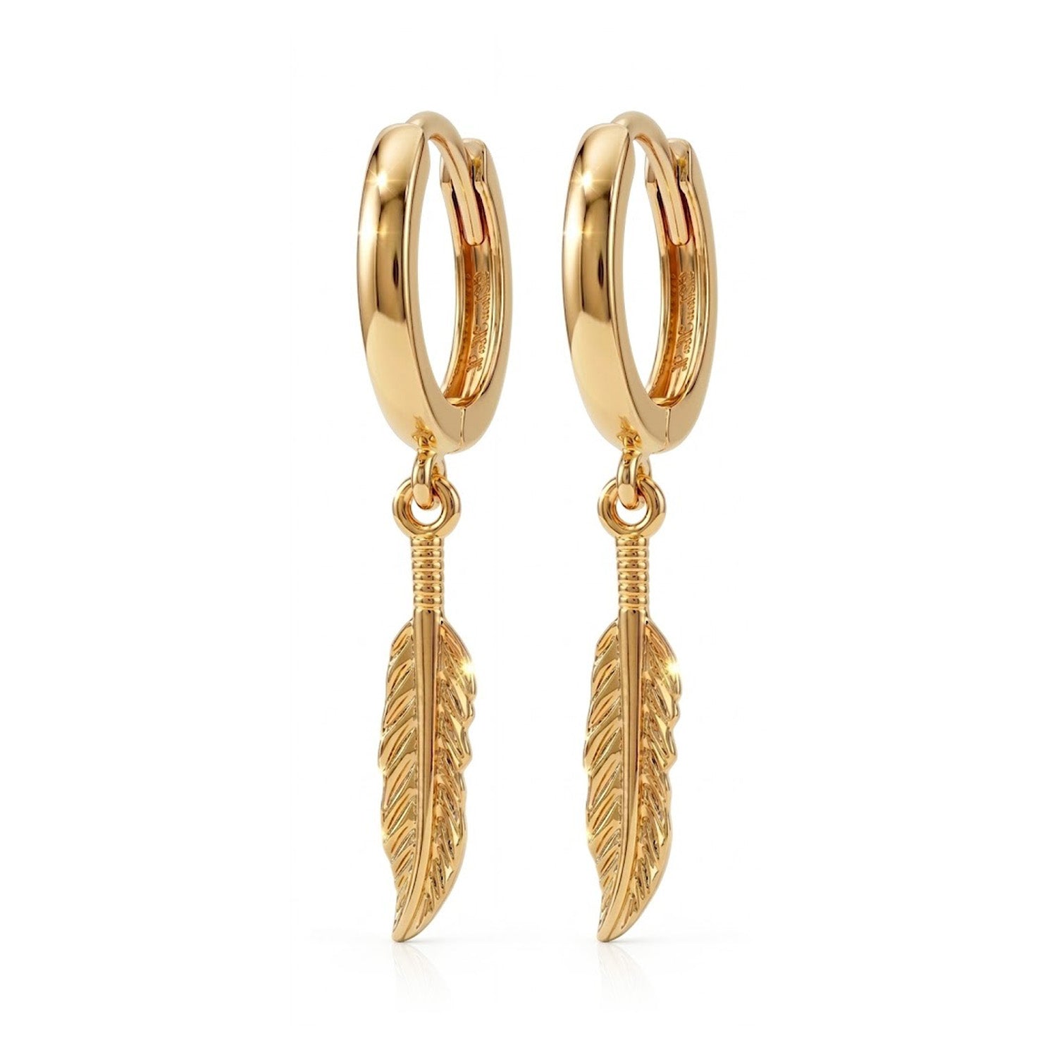 A pair of gold huggie hoop earrings with dangling feather charms, shown on a clean white background.