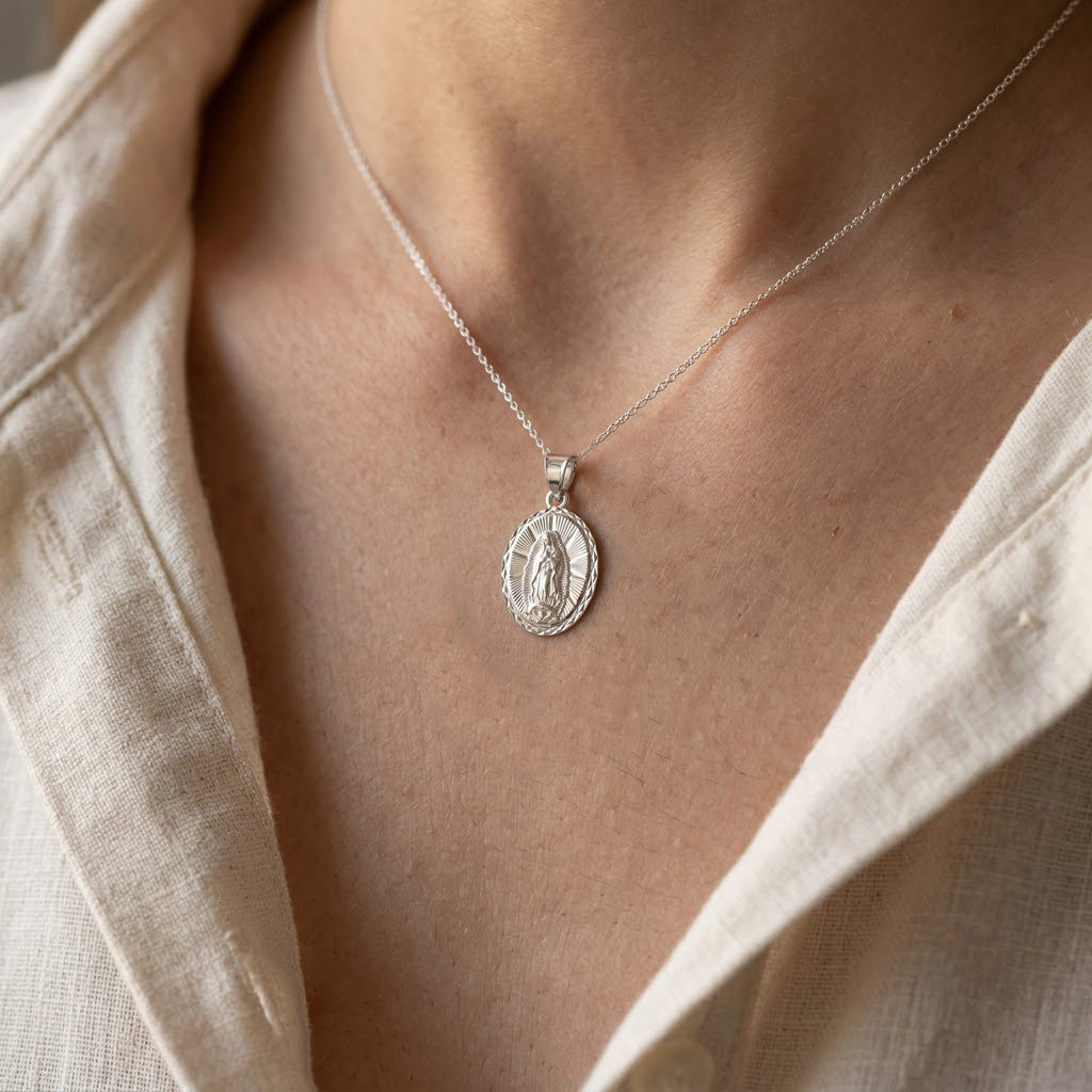 Silver Lady of Guadalupe Necklace
on a person wearing a beige shirt.