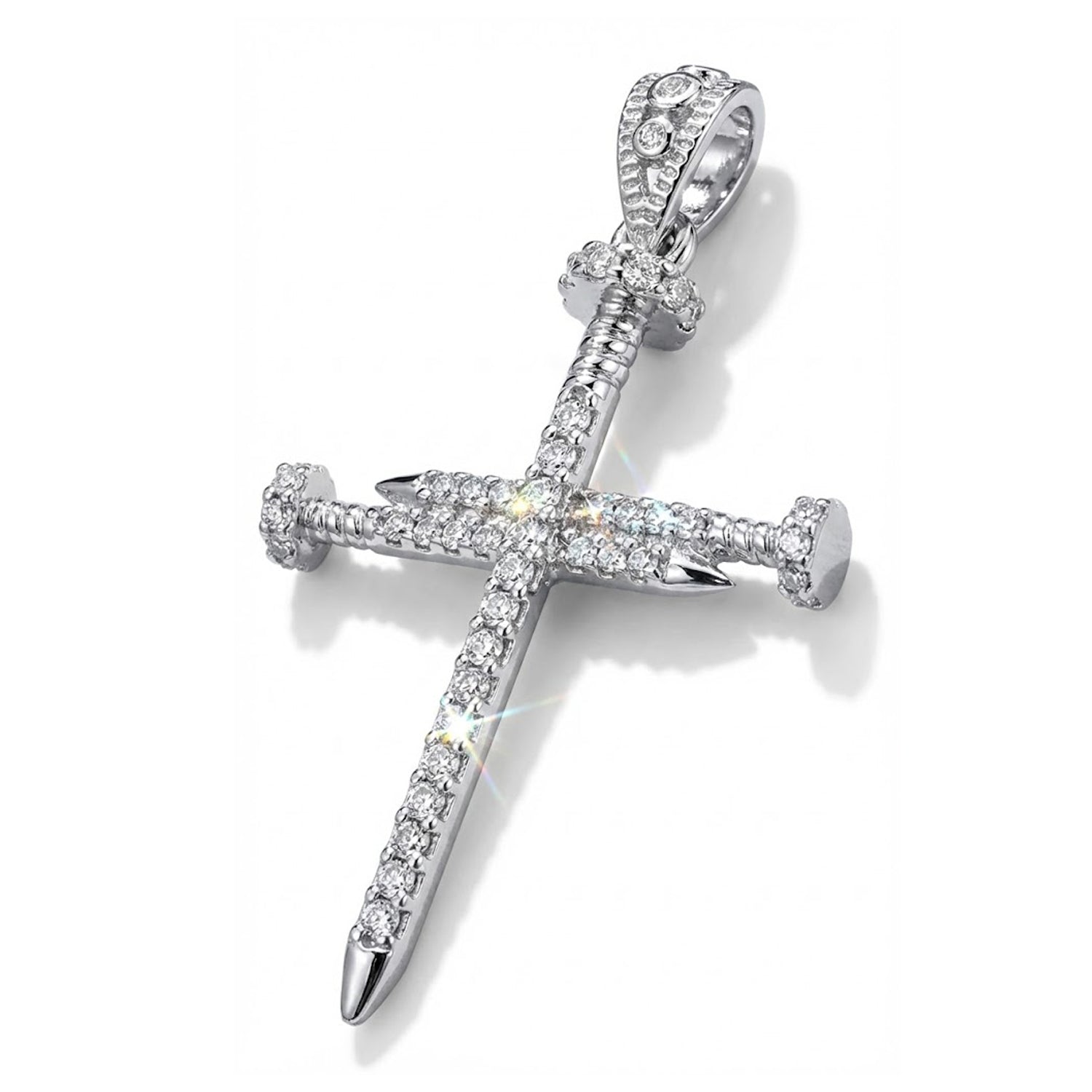 A silver cross pendant encrusted with clear gemstones, featuring a detailed hilt design and a polished pointed tip, shown on a clean white background.