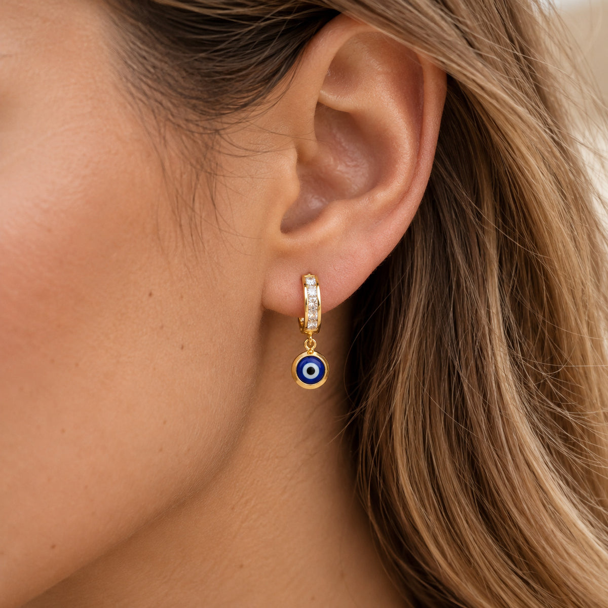 gold evil eye dangle eargin