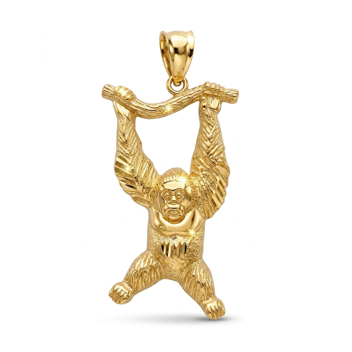 Gold monkey pendant on a white background