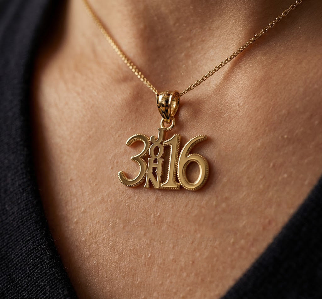 Gold necklace with a pendant displaying Gold John 3:16 Bible Verse on a person's neck.
