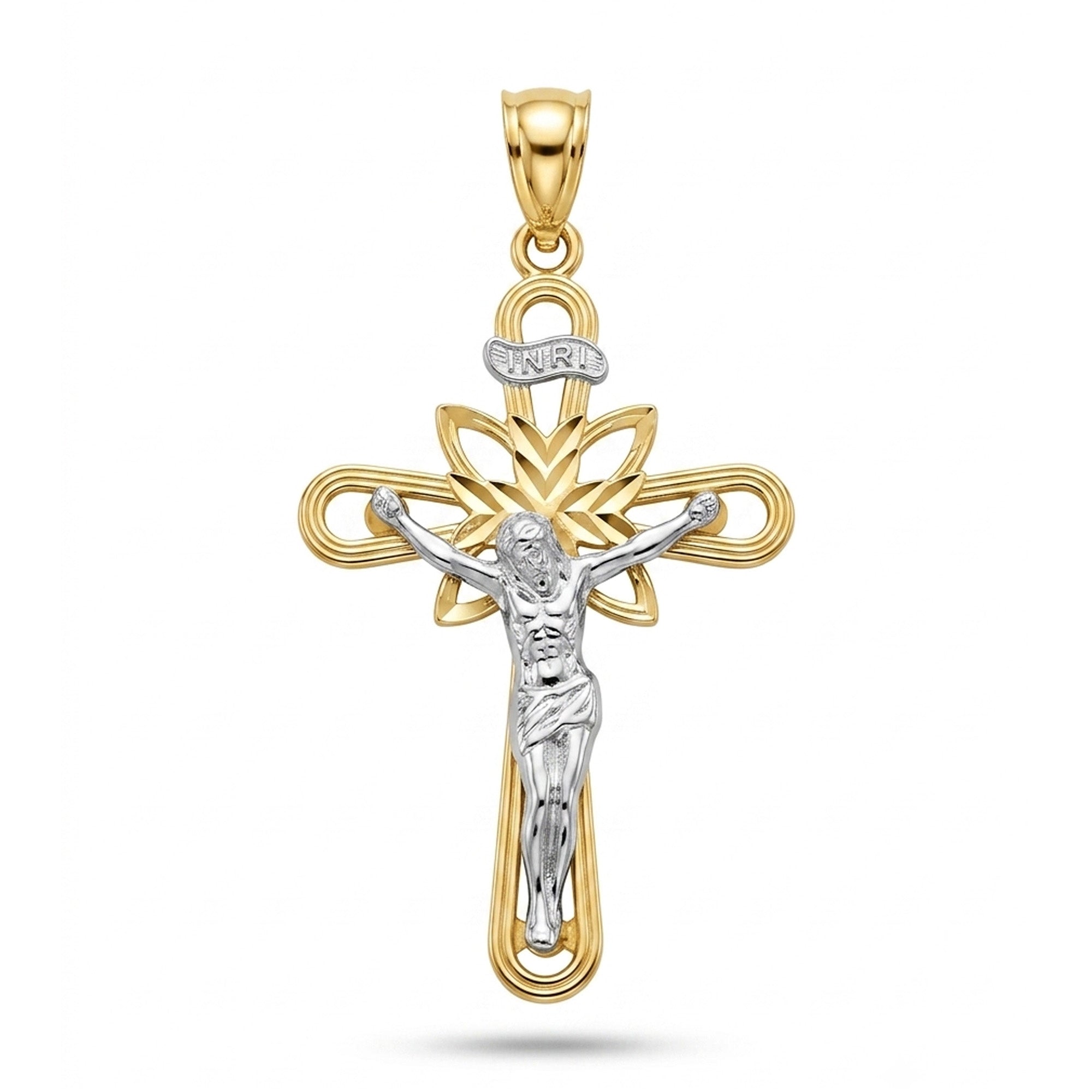 A two-tone gold and silver crucifix pendant featuring a detailed silver corpus of Jesus Christ on a gold cross with a floral motif and 'INRI' inscription, shown on a white background.