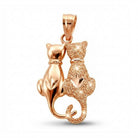 [group: rose-gold] Gold cat-shaped pendant on a white backgroundRose gold cat-shaped pendant on a white background
