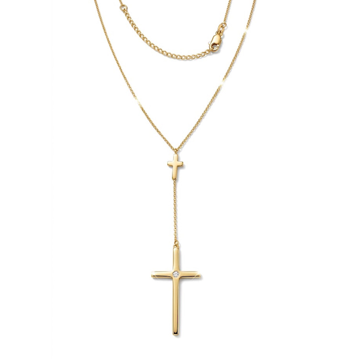 Gold cross necklace on a white background