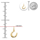 Gold crescent moon pendant with measurement scale and quarter coin for size reference on a white background