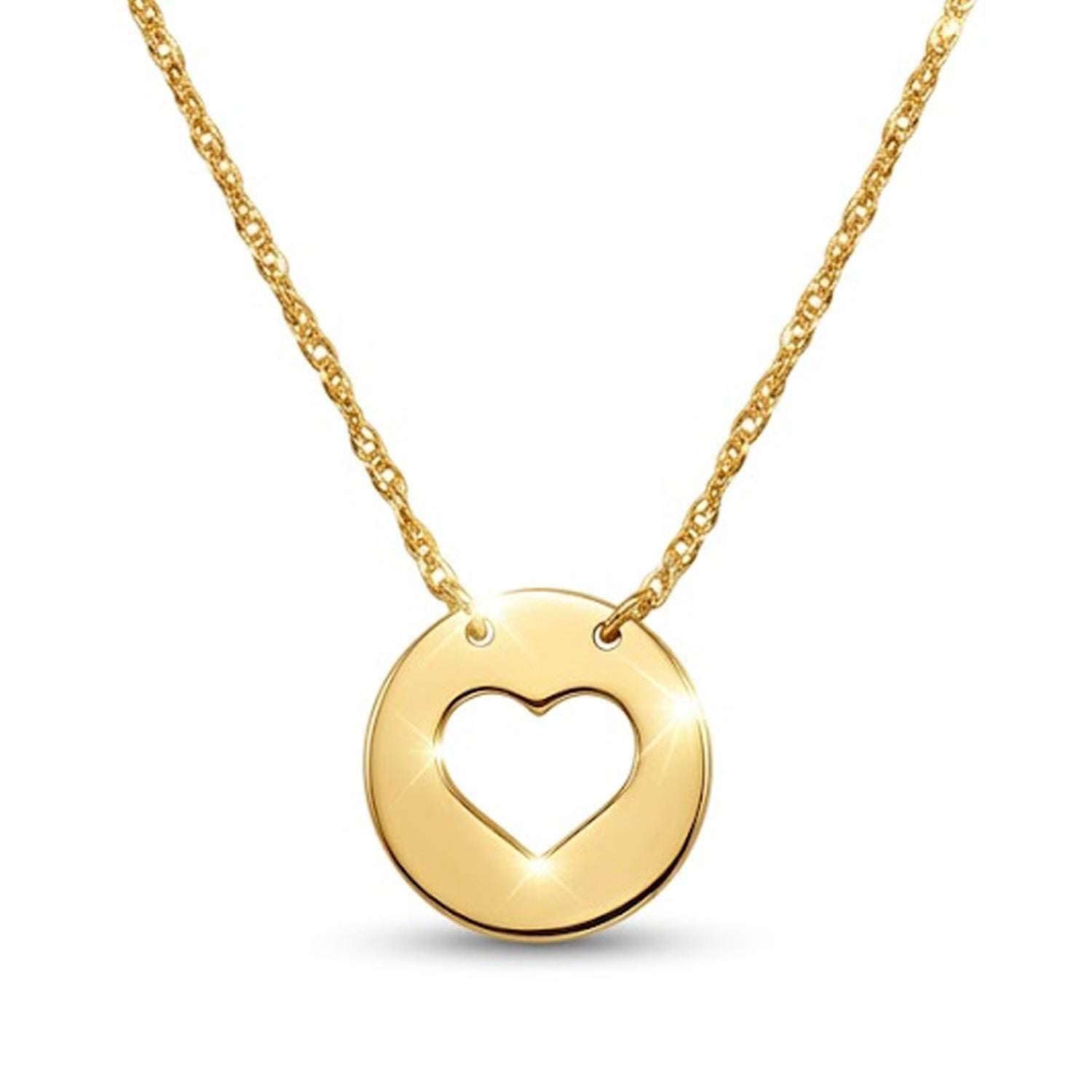 Gold necklace with a heart-shaped pendant on a white background