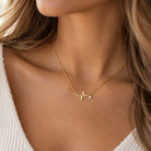 gold heartbeat necklace with heart cz charm 