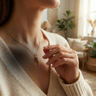 [group: large] Gold Italian Horn Pendant on female model 