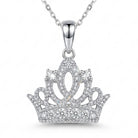 Silver crown-shaped pendant necklace on a white background