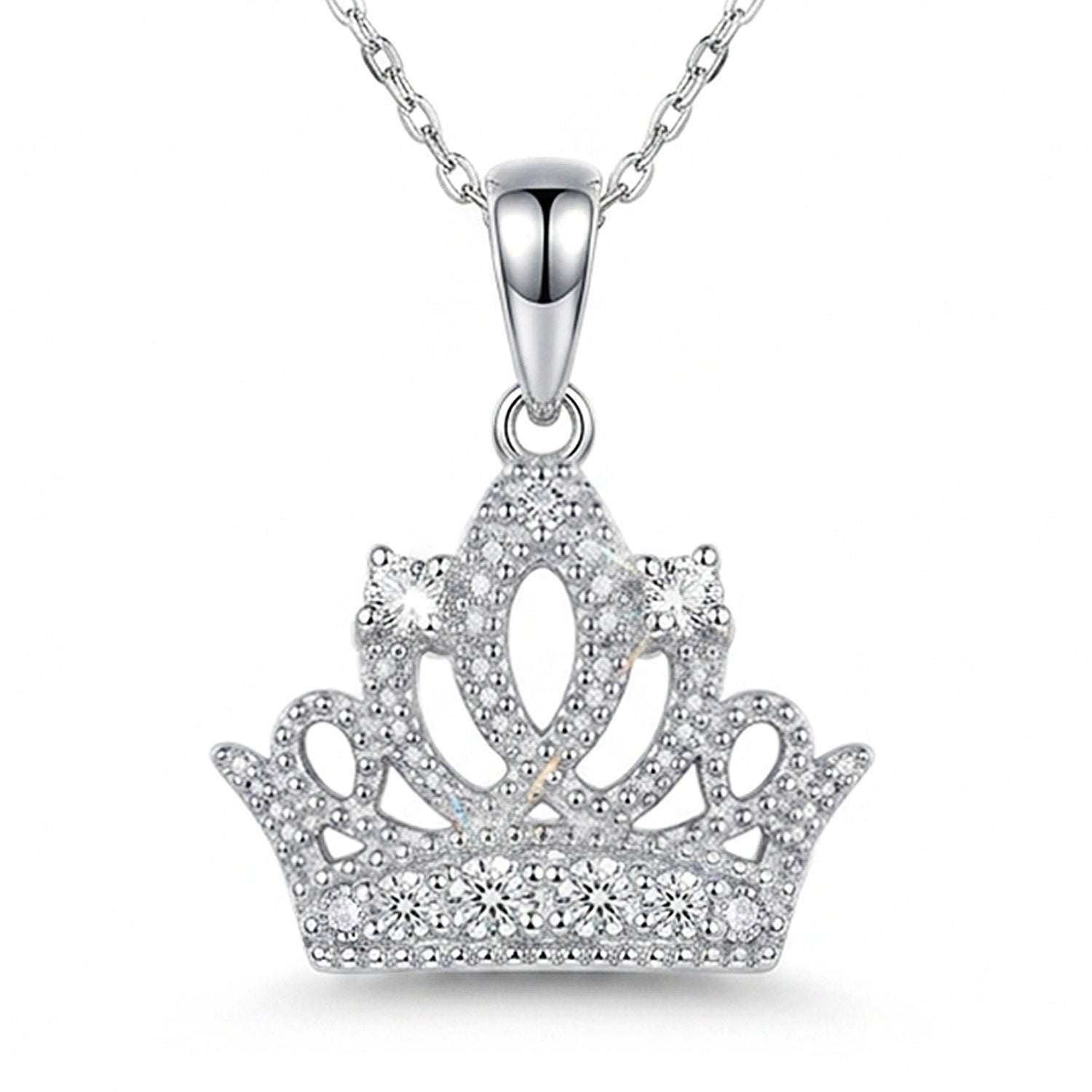 Silver crown-shaped pendant necklace on a white background