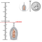 Silver and rose gold Miraculous Medal pendant with clear crystal accents, shown with a vertical measurement ruler in inches, a US quarter coin for scale, and a close-up inset of the pendant.