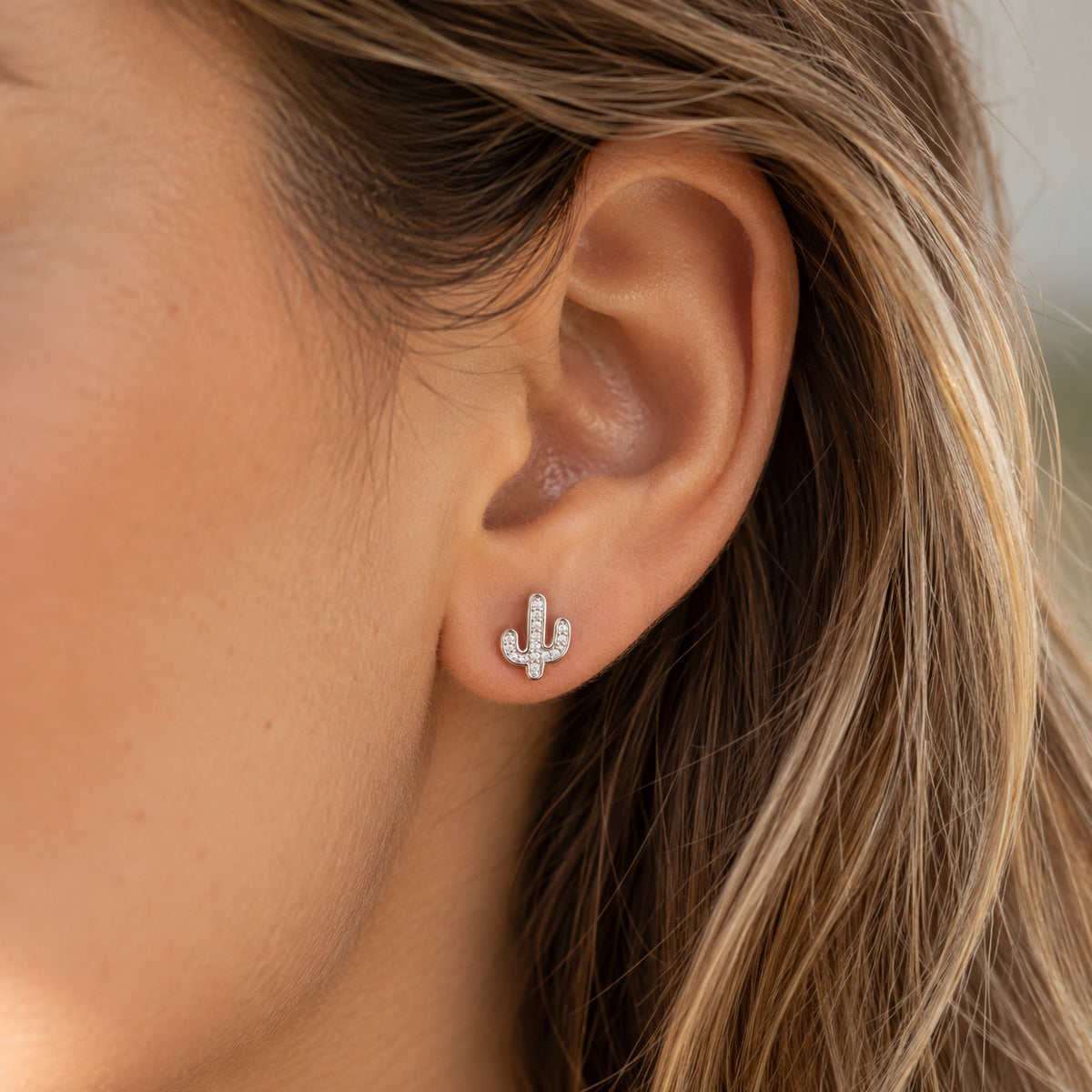 silver catus earring with cz stones 