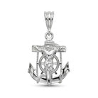 A silver anchor and crucifix pendant charm with a central figure, detailed with small clear stones, shown on a plain white background.