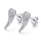 A pair of silver angel wing stud earrings with small clear gemstones at the top of each wing, shown on a clean white background.