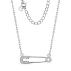[group: silver] A silver safety pin pendant necklace with small clear stones set along the front and one end, shown on a white background with the chain and clasp visible.