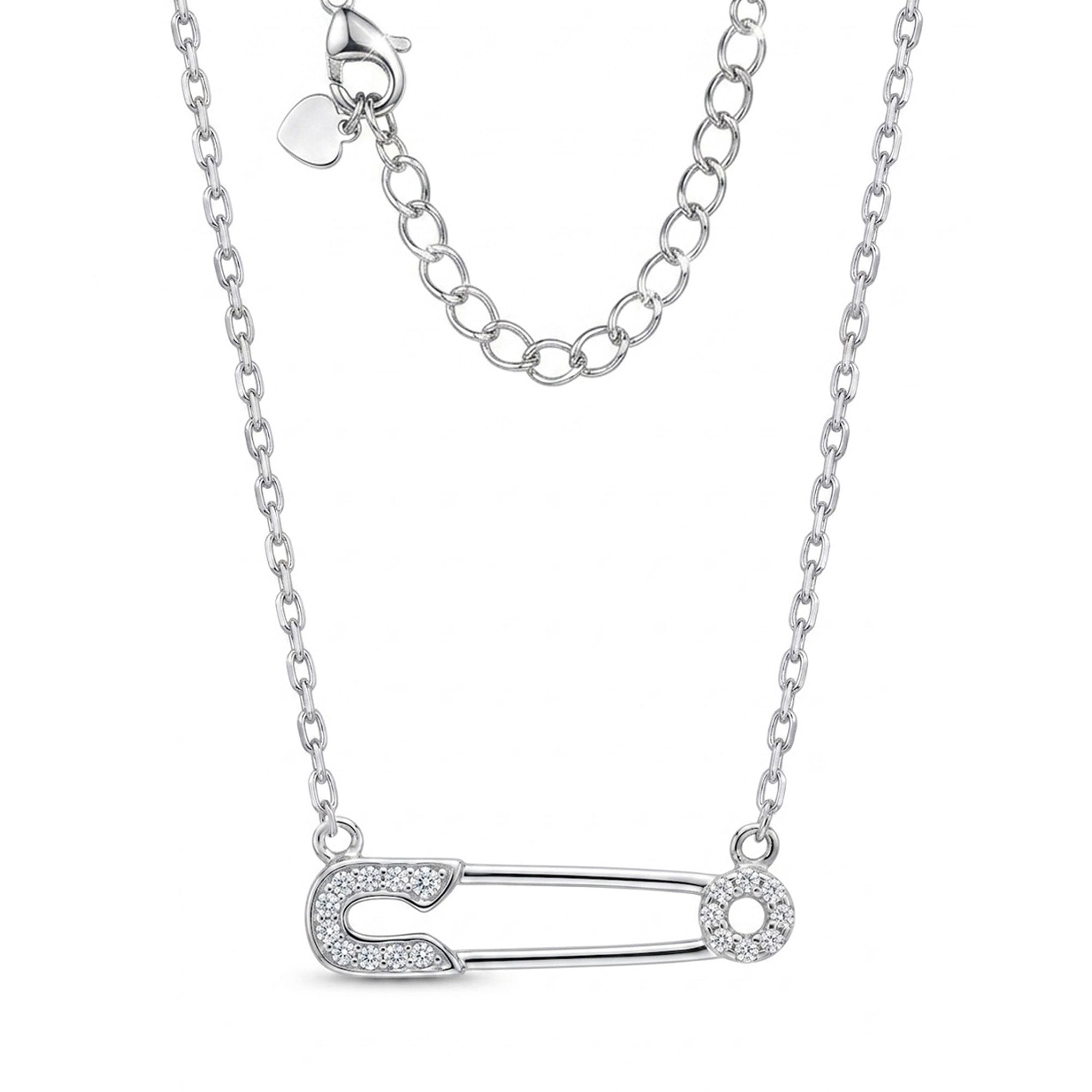 [group: silver] A silver safety pin pendant necklace with small clear stones set along the front and one end, shown on a white background with the chain and clasp visible.