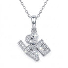 Silver 'LOVE' pendant necklace with heart design on a white background