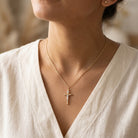 Gold Two Tone Jesus Crucifix Pendant worn by female model 