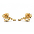 A pair of gold post earrings with a curved, hook-like design, displayed on a clean white background.