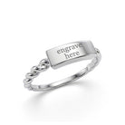 A silver nameplate ring with a twisted band and a rectangular top engraved with the placeholder text 'engrave here', shown on a clean white background.