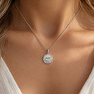 [group: large] silver cherub medallion pendant 