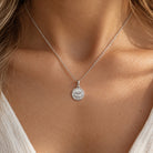[group: small] silver cherub medallion pendant 