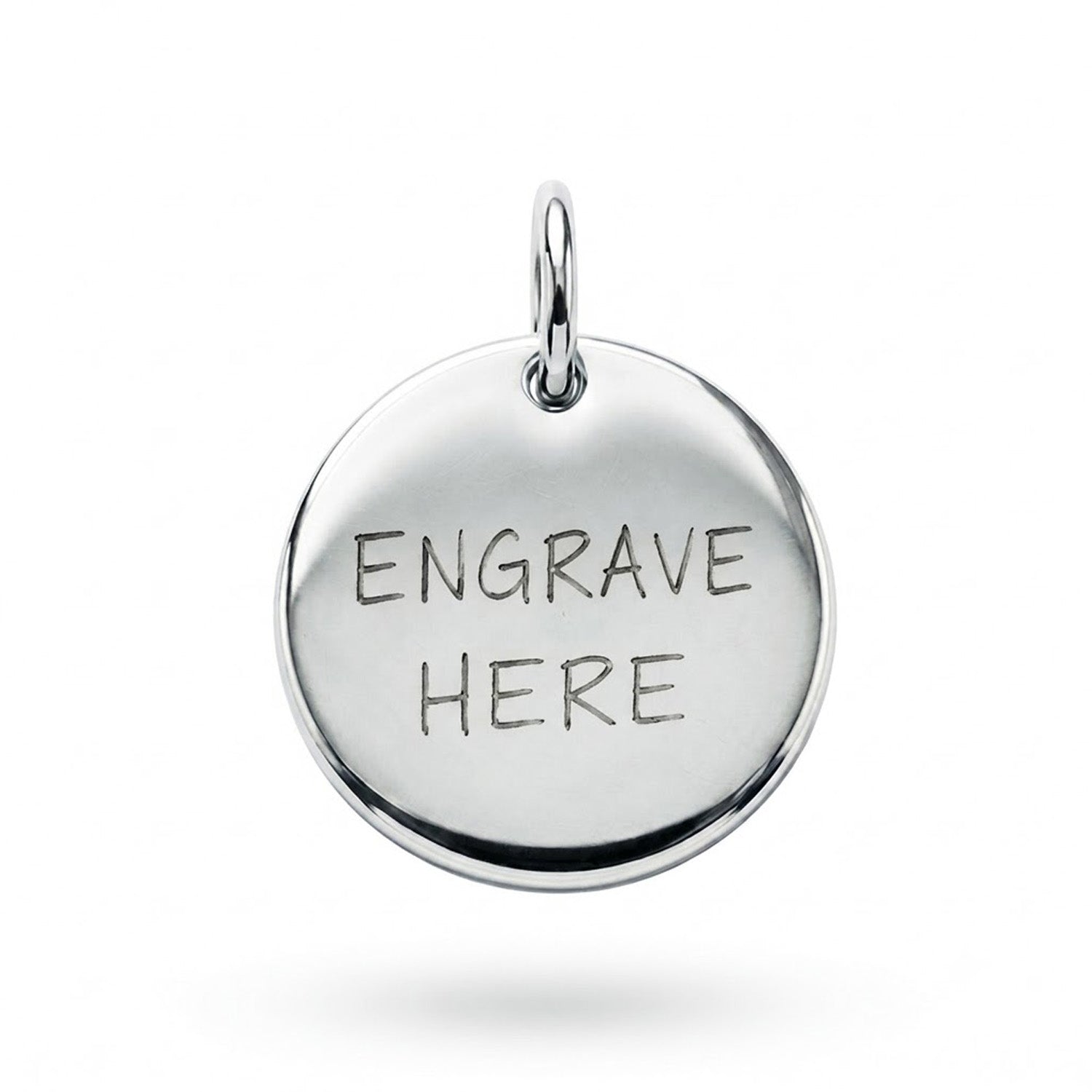 [group: silver] A round sterling silver pendant charm with a polished finish, featuring the engraved text 'ENGRAVE HERE' on its face and a small top loop, shown against a plain white background.