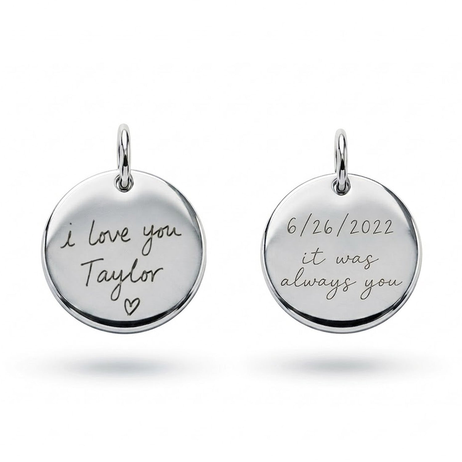 [group: silver] A round silver pendant charm with a top loop, featuring the engraved text 'ENGRAVE HERE' on a clean white background.