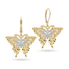 A pair of butterfly drop earrings in yellow gold with a pavé-set silver center on a white background.