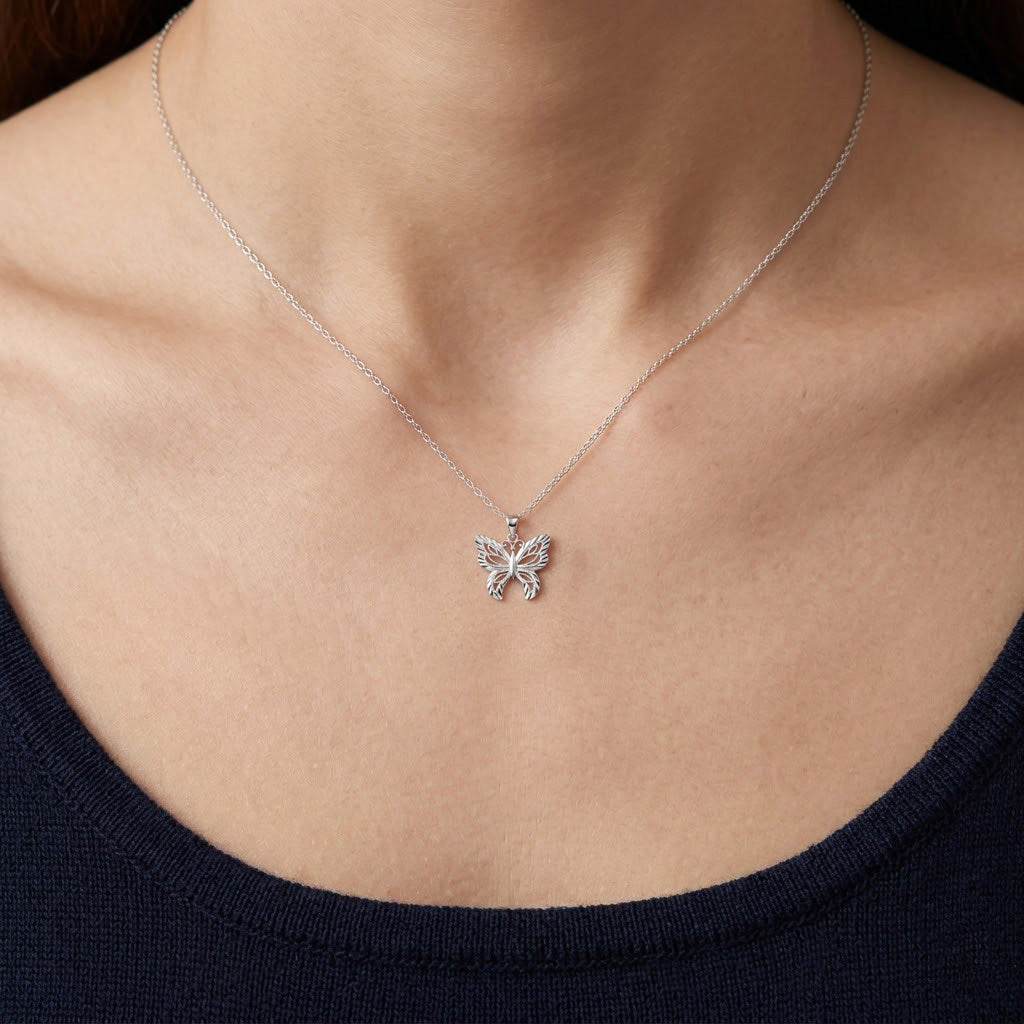Silver butterfly Necklace worn by female model 
