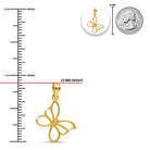Gold butterfly pendant with size measurement against a coin for scale on a white background