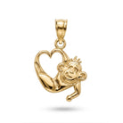 A polished yellow gold pendant featuring a monkey climbing over a heart-shaped outline, shown on a clean white background with a soft drop shadow.