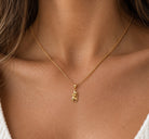 Gold cat bow charm 