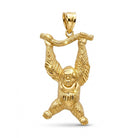 Gold monkey pendant on a white background