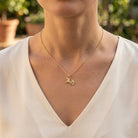 [group:small] 10K Gold Unicorn Pendant. 