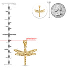 Gold dragonfly pendant with size measurement against a quarter for scale on a white background