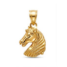 Gold horse head pendant on a white background