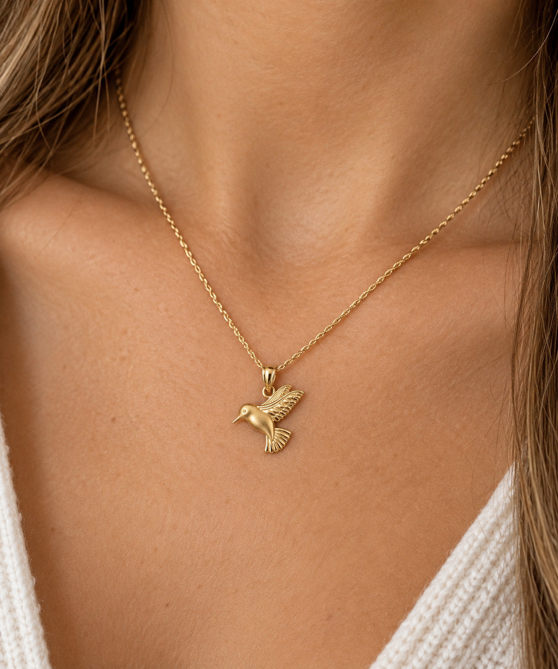 gold humminbird pendant