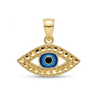 A gold evil eye pendant featuring a blue and black enamel eye in the center, surrounded by small gold dots, on a plain white background.