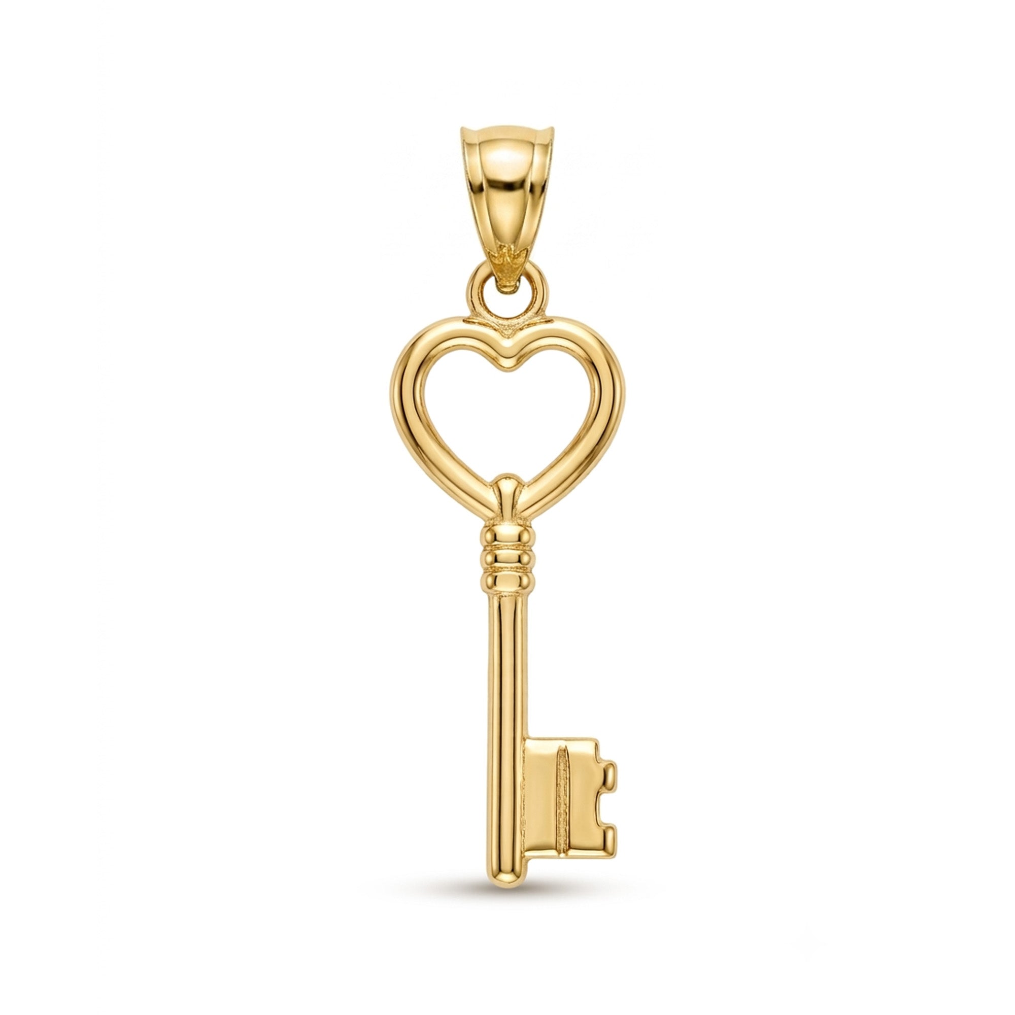 A polished yellow gold key pendant with a heart-shaped keyhole, shown on a clean white background.