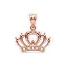[group: rose]A rose gold crown pendant with a polished finish, featuring an openwork design with a heart-shaped center and a decorative bail at the top, shown on a plain white background.