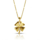 [group:10k-gold] Gold four-leaf clover pendant on a chain against a white background