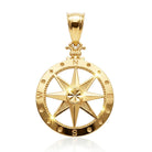 [group: large] Gold compass pendant on a white background