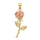 A rose pendant charm made of yellow gold and rose gold metals, featuring a textured rose bloom, stem, and leaves, suspended from a gold bail on a plain white background.