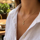 Beautifully handcrafted Fleur De Lis charm with ball charm with full solid 10 karat gold. This makes a fantastic gift choice for any of your loved ones and friends. This mini charm will be sure to impress! Fleur De Lis is often tied to the essence of royalty and power.