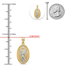 An oval pendant with a gold and silver angel design, shown with measurement markings, a 22 mm height red line, a top inset of the pendant on a white circle, and a silver quarter coin for scale on a white background.