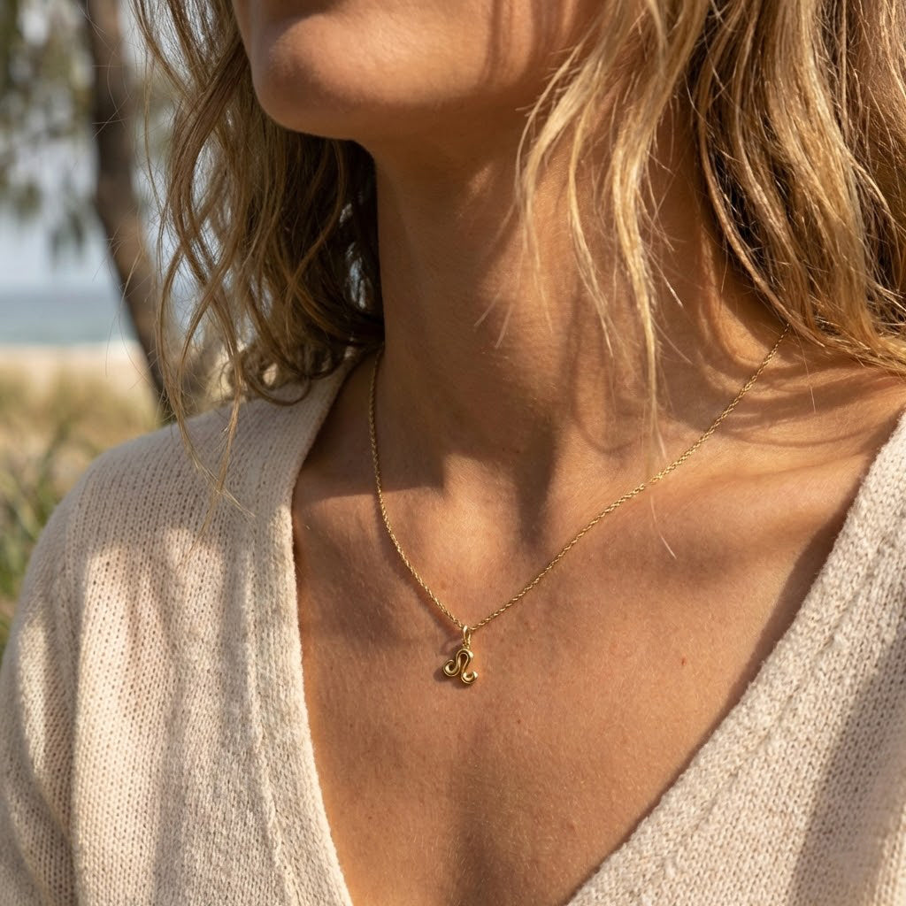 [group: leo] Gold leo zodiac pendant 